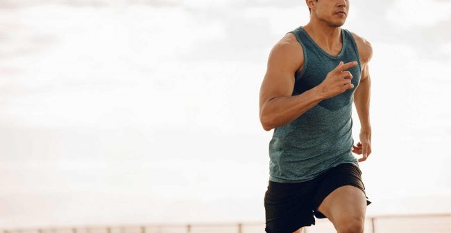 corredor la respiración en el deporte
